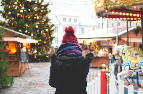 Christmas fare in Hertfordshire woman walking to theatre